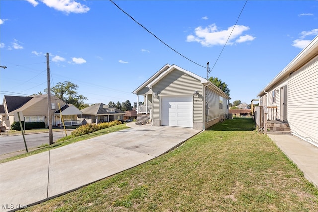 garage with a yard