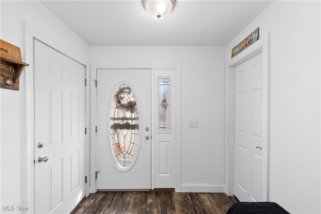 foyer with dark hardwood / wood-style flooring