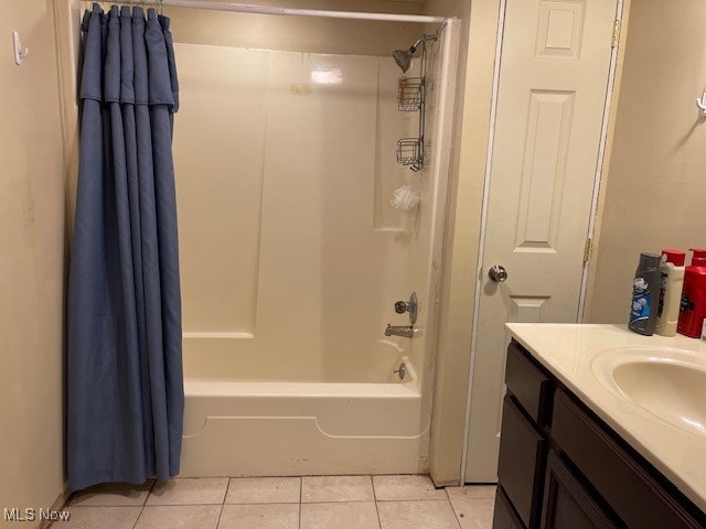 bathroom with vanity, tile patterned floors, and shower / bath combo