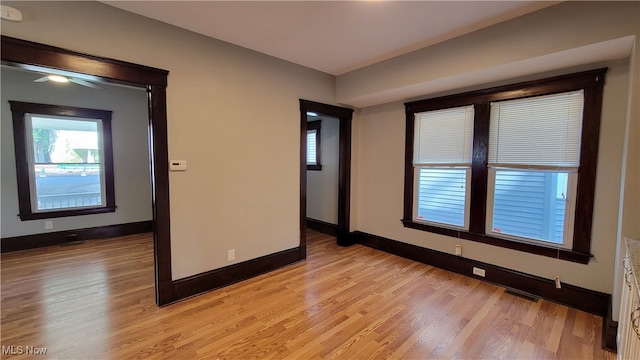 empty room with light wood-type flooring