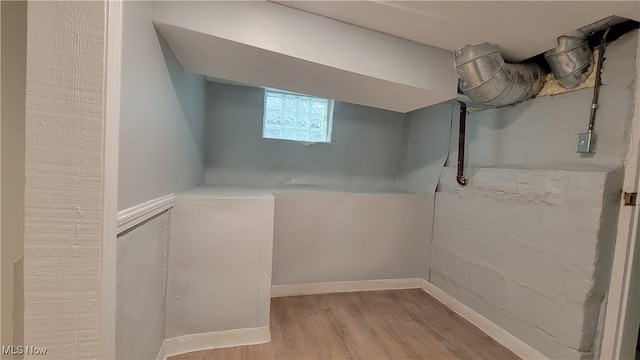 basement with light wood-type flooring