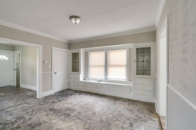 interior space with crown molding