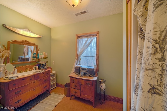 bedroom with a textured ceiling