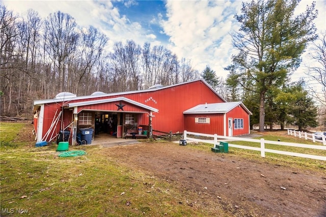 10000 Wisner Rd, Chardon, OH 44024 - exterior space featuring an outbuilding, fence, a pole building, and a yard