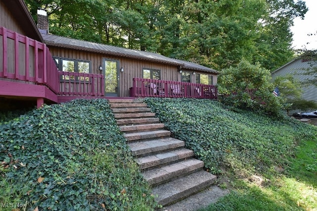 exterior space with a wooden deck