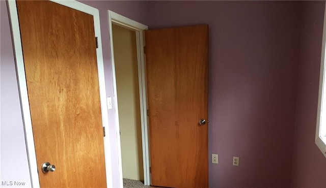 unfurnished bedroom with a closet