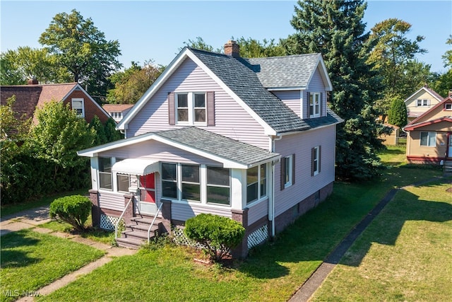 view of front facade featuring a front yard