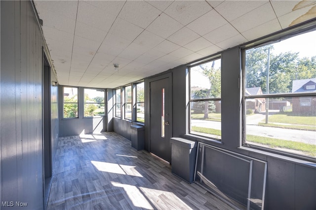 unfurnished sunroom with a healthy amount of sunlight