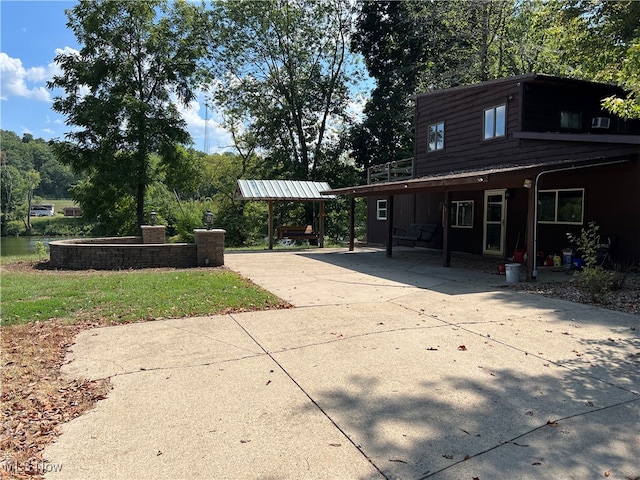 exterior space featuring a carport