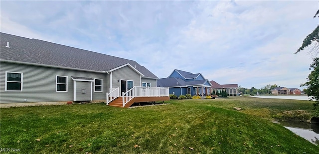 exterior space with a lawn and a deck