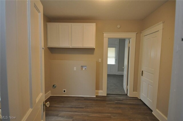 laundry area with cabinets, hookup for an electric dryer, washer hookup, and dark hardwood / wood-style flooring