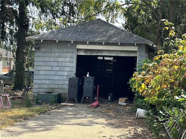 view of outbuilding featuring a garage