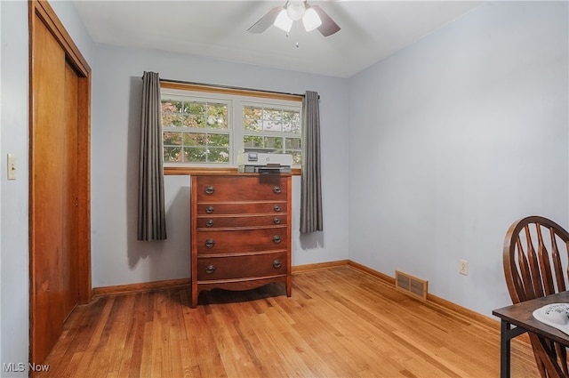 bedroom featuring light wood-type flooring and ceiling fan