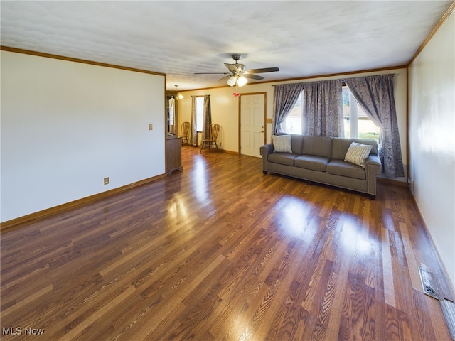 unfurnished living room featuring a textured ceiling, ceiling fan, dark wood-type flooring, and crown molding