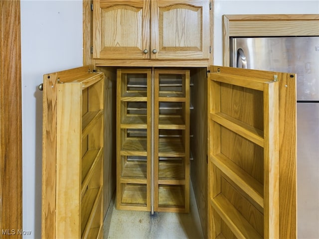 interior details with stainless steel fridge