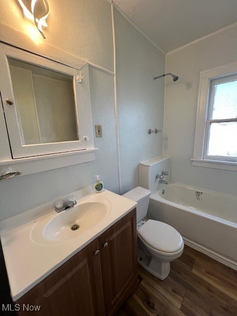 full bathroom with wood-type flooring, vanity, toilet, and bathtub / shower combination