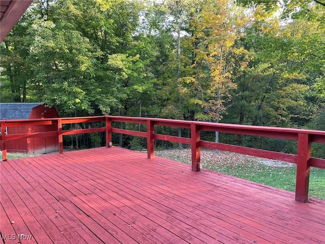 wooden terrace with a storage unit