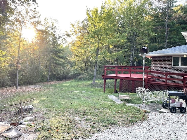 view of yard with a deck