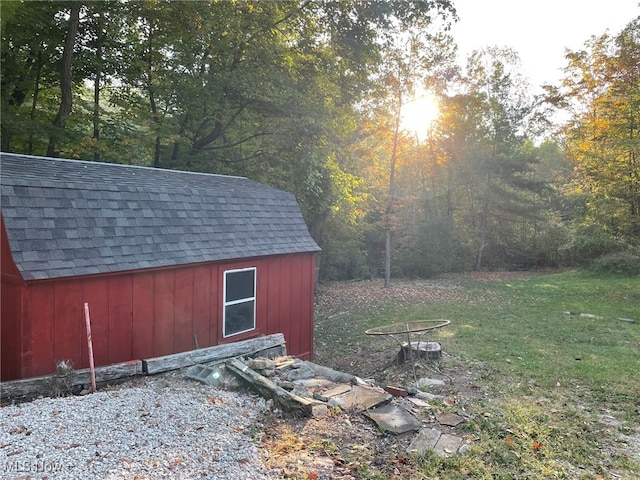 view of outdoor structure with a yard