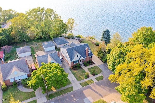 bird's eye view with a water view