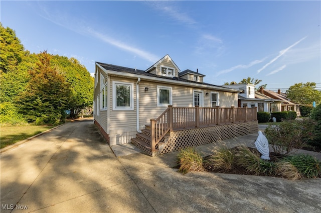 view of front of property featuring a deck