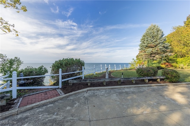 view of patio / terrace featuring a water view