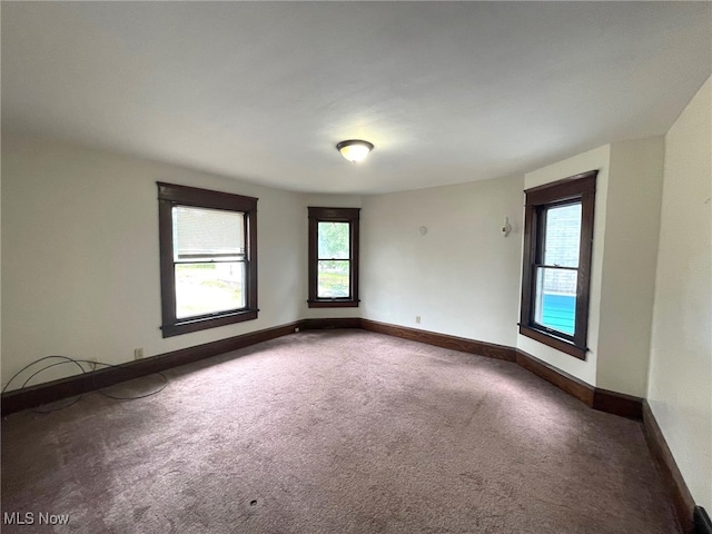 view of carpeted spare room