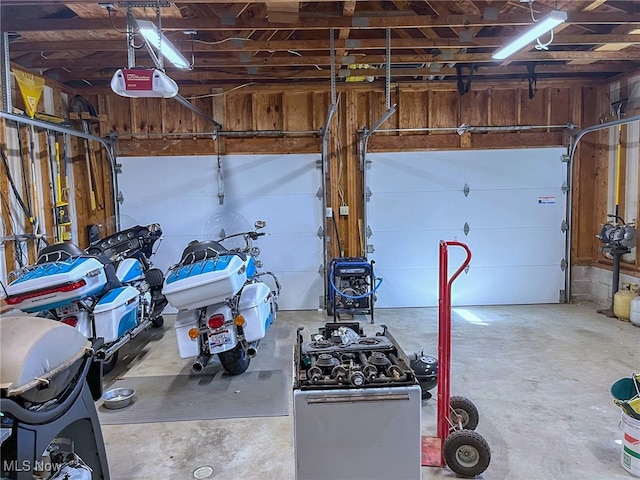 garage featuring a garage door opener