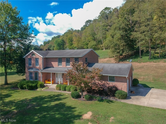 view of front of home with a front yard