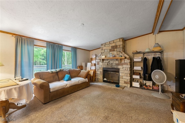 living room with a textured ceiling, carpet floors, a stone fireplace, vaulted ceiling with beams, and crown molding