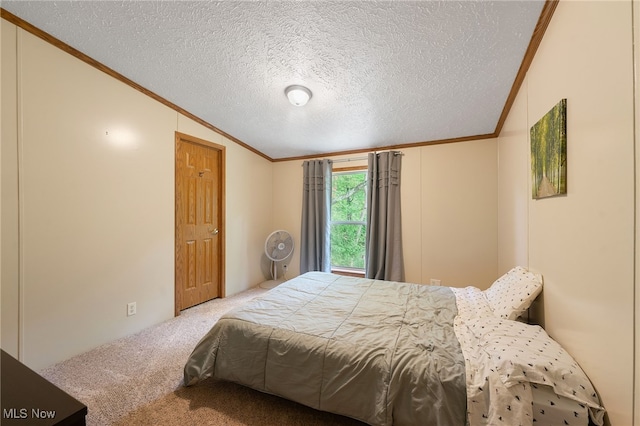 bedroom with carpet floors, ornamental molding, a textured ceiling, and vaulted ceiling