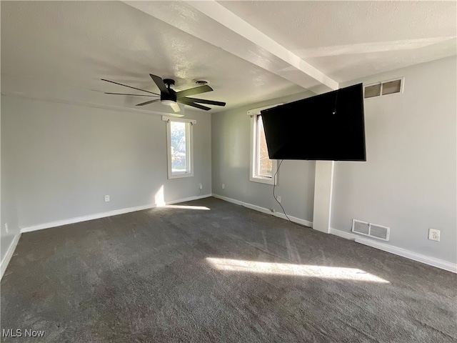 carpeted empty room with a textured ceiling and ceiling fan