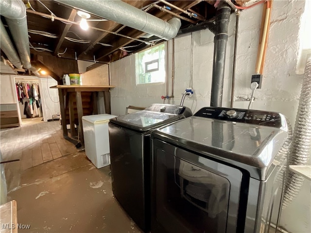 washroom featuring independent washer and dryer