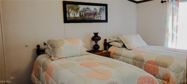 bedroom with multiple windows