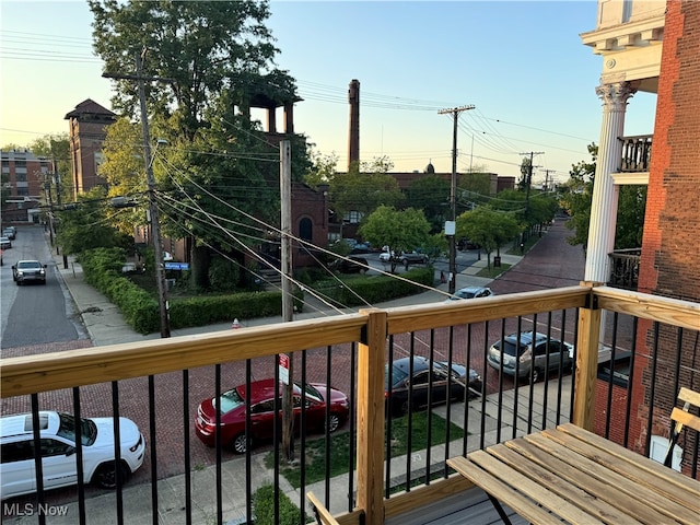 view of balcony at dusk