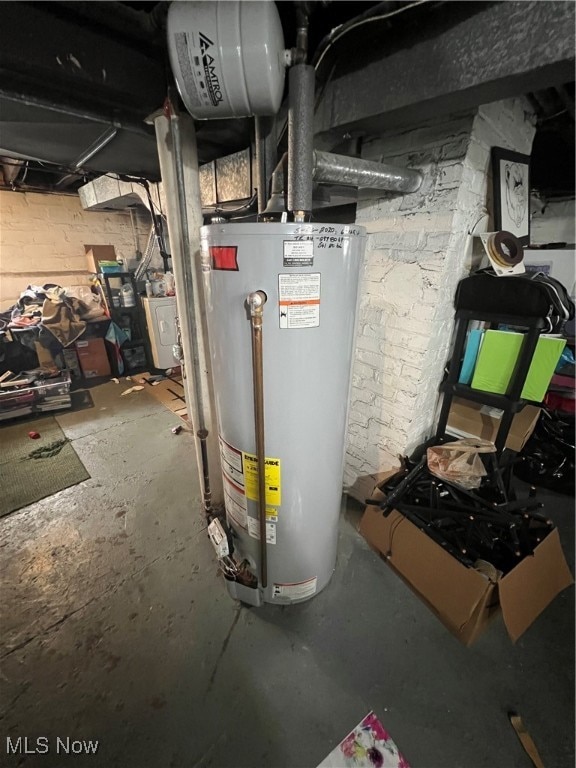 utility room with gas water heater