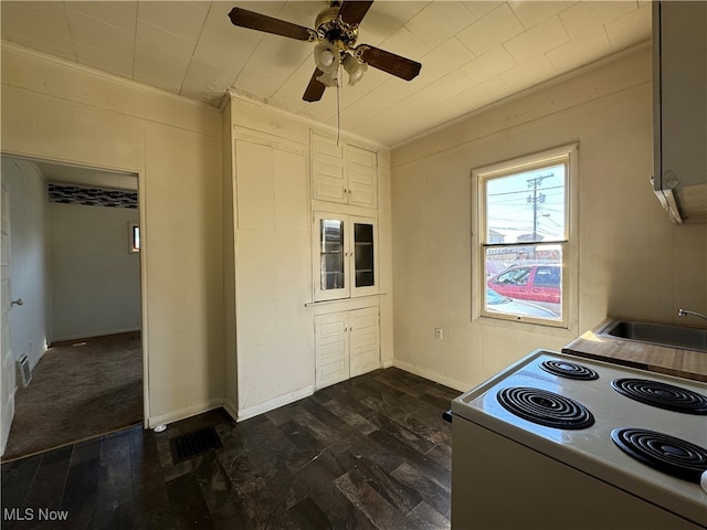 kitchen featuring sink, ceiling fan, dark hardwood / wood-style floors, and white electric range