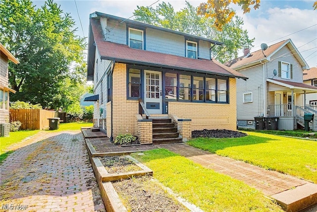 view of front of home with a front yard