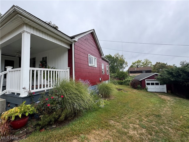 view of side of home featuring a yard