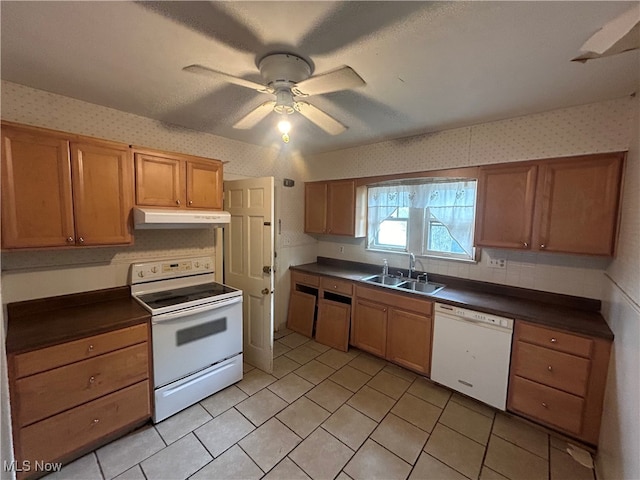 kitchen with white appliances, ceiling fan, and sink