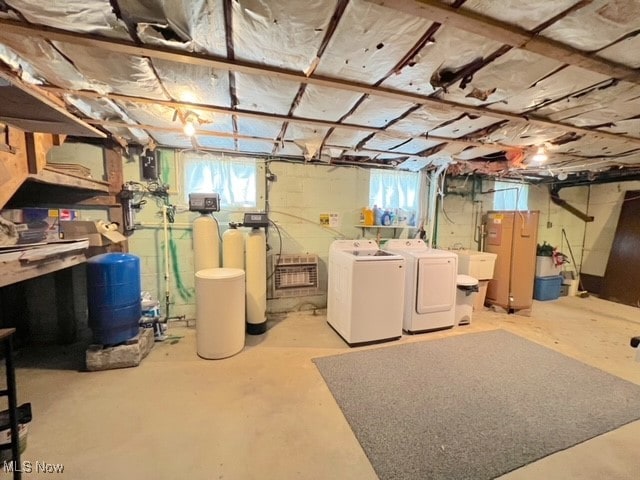 basement with washing machine and dryer