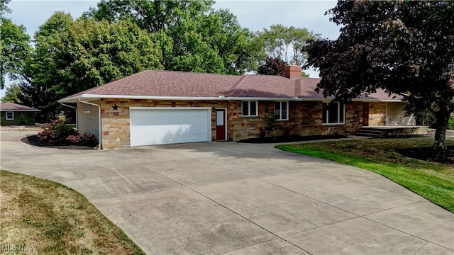 ranch-style home with a garage