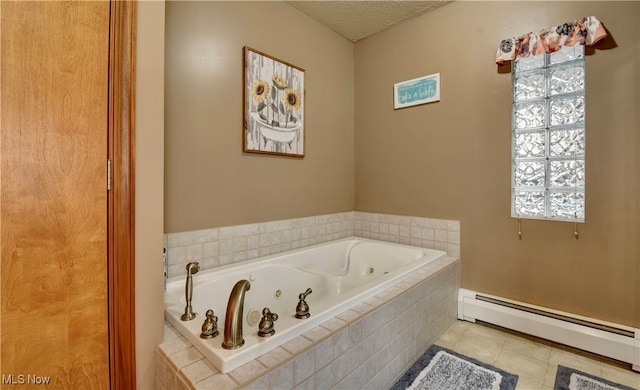 bathroom featuring a relaxing tiled tub, baseboard heating, tile patterned flooring, and a wealth of natural light