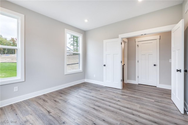 empty room featuring light hardwood / wood-style floors