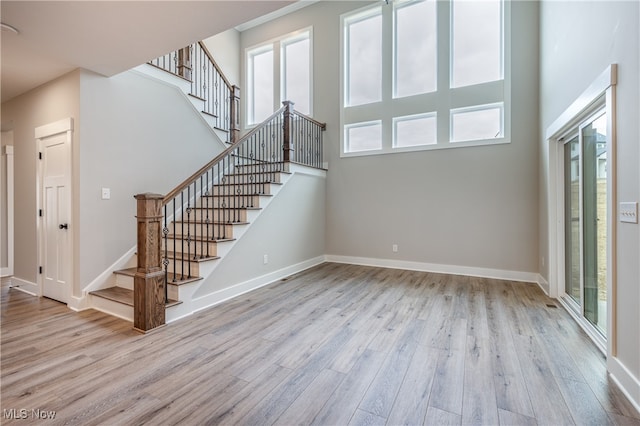 unfurnished living room featuring light hardwood / wood-style floors