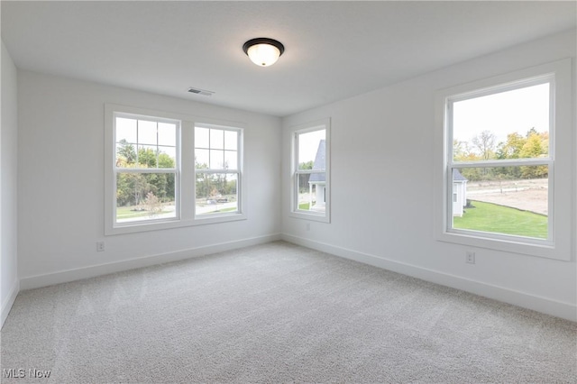 empty room with carpet flooring