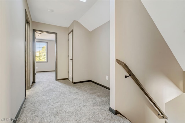 hallway with light carpet