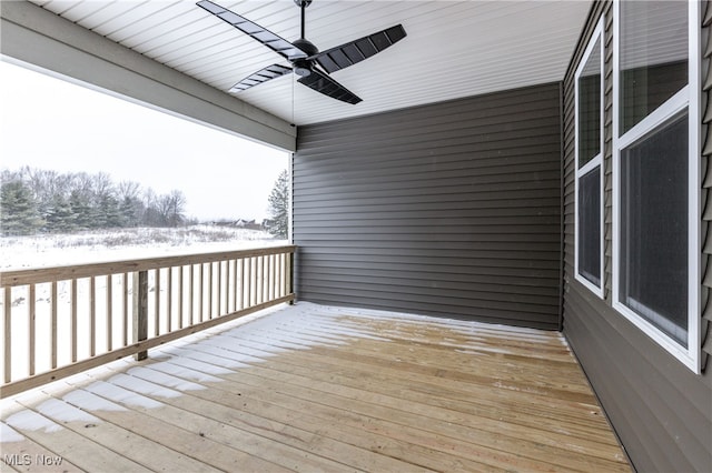 snow covered deck with ceiling fan