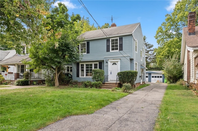 view of front facade featuring a garage and a front yard