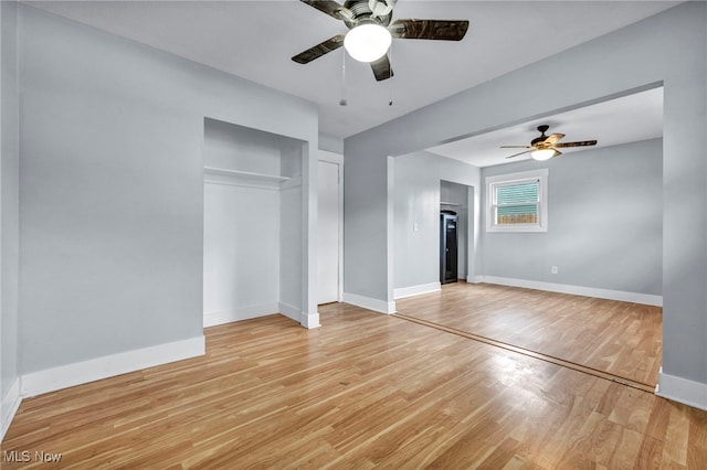 unfurnished bedroom with light hardwood / wood-style floors and ceiling fan